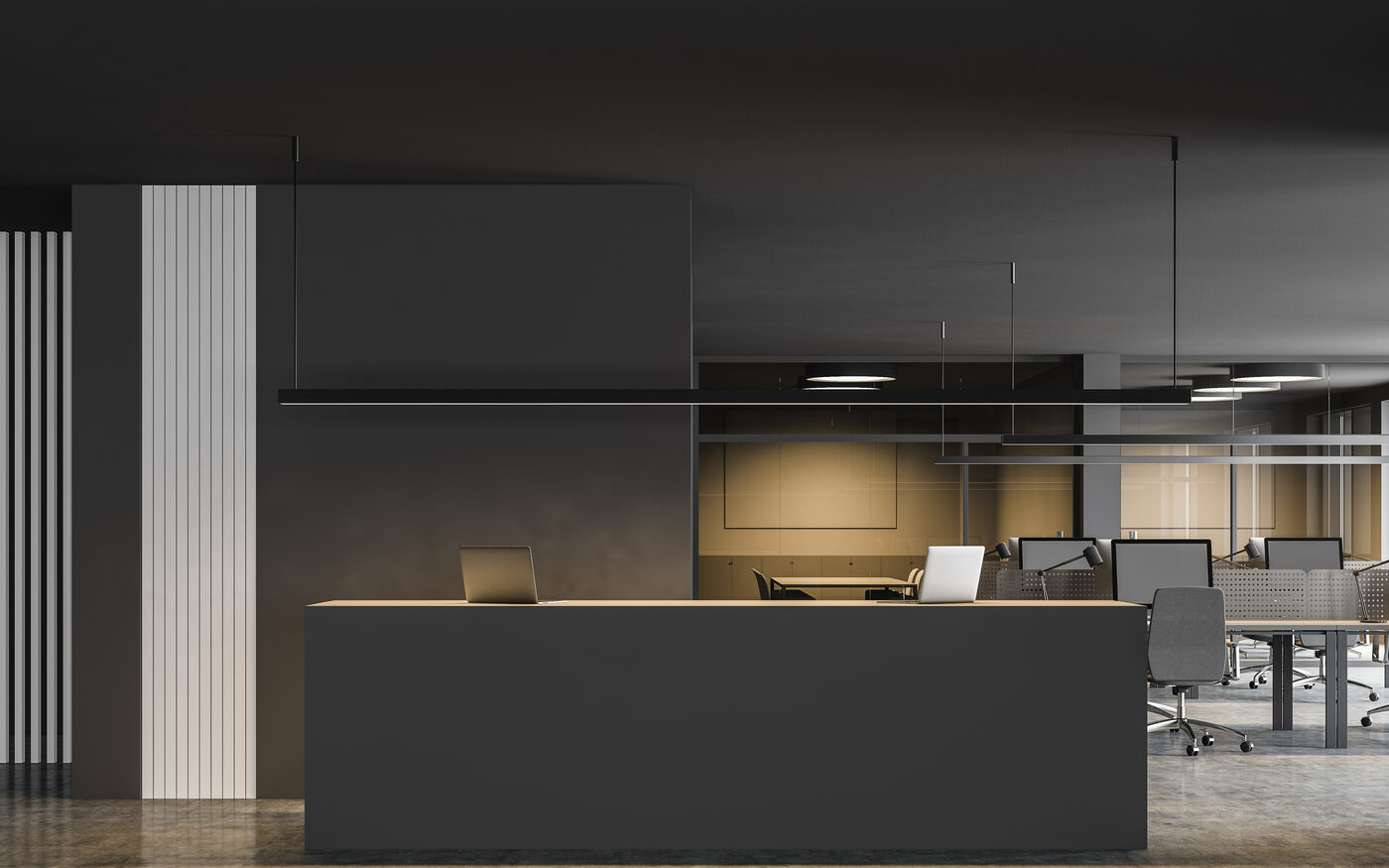 After: a finished modern commercial interior with a reception desk and clean branded design